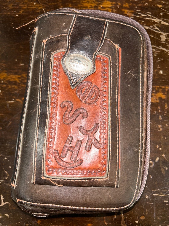 Made in Paraguay and hand tooled wallet by America