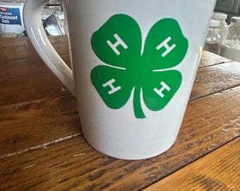 Vintage 4H logo mug by Royal Norfolk. Holds aprox 14 ounces. Nice condition. Marked Microwave and dishwasher safe
