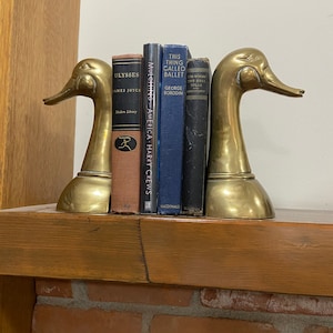 Set of two brass mallard duck bookends in nice condition for your library!