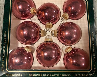 Krebs like new,in box,shiny pink glass ornaments total eight in  box and I have one box available.Have the Krebs traditional crowns