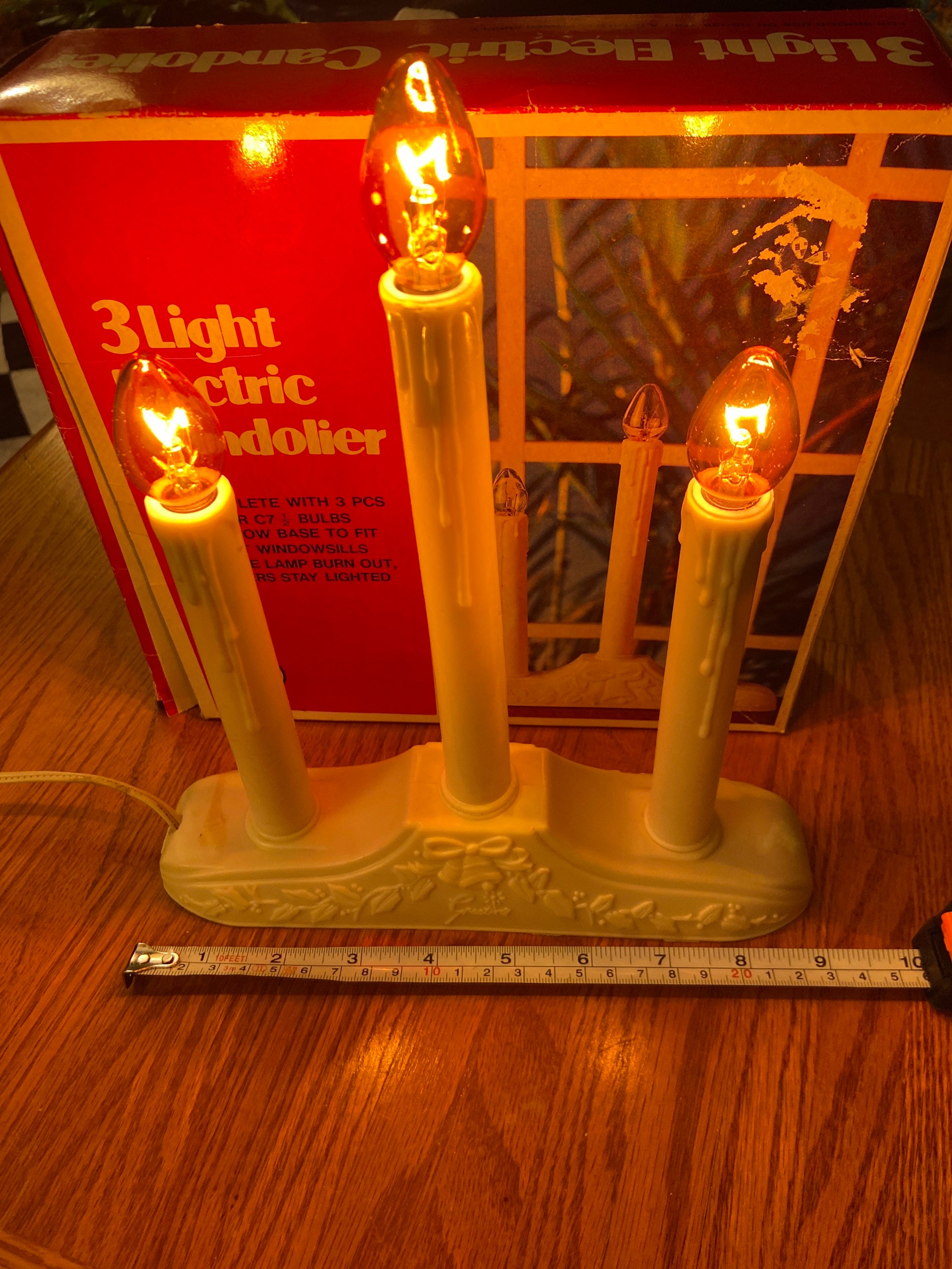 Three light electric candolier in box.