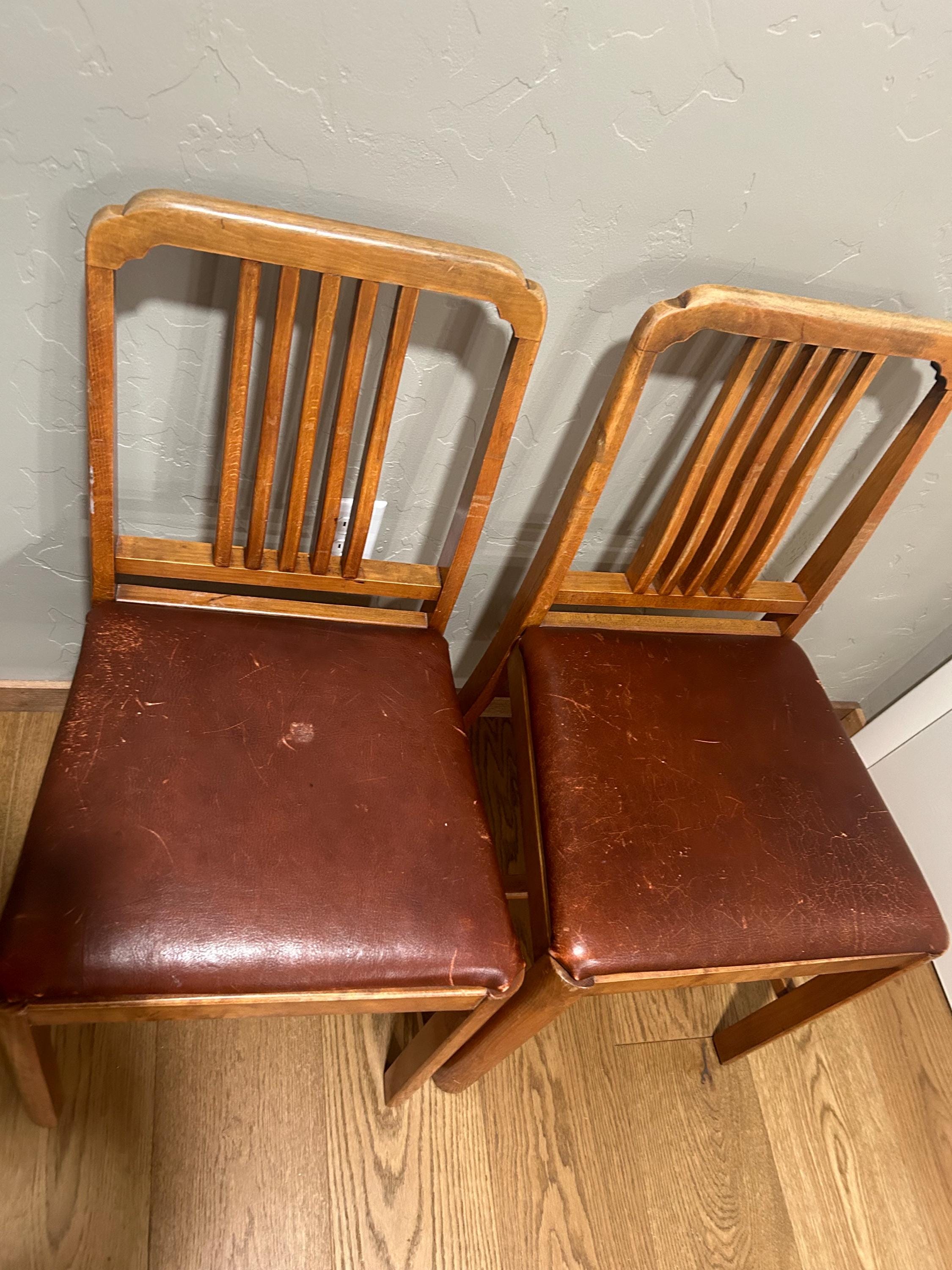 1940s retro pair of wooden chairs with leather seats. One