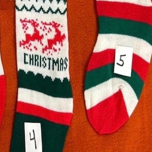 Vintage Christmas socks in nice condition I have two available. Convo me with your choice. Number 4, or 5