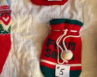 Knit vintage Christmas gift bags or small knit stocking.These are Not hand knit.Used vintage. Price is for one item. Please convo me number
