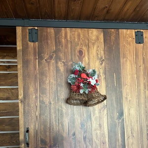 One old large pair Christmas bells made of grapevine/wicker/natural material decorated with bright holiday seasonal decor! 3 sets available!