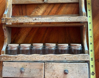 Rustic country old wooden(with 2 drawers)spice rack with brass rooster and two stars at the top of rack. Includes six spice bottles.