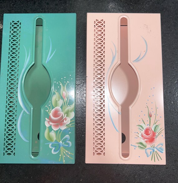 Metal MCM tissue dispenser with hand done floral tole painting on it.Two available.Price for one.See photos for condition.Specify choice