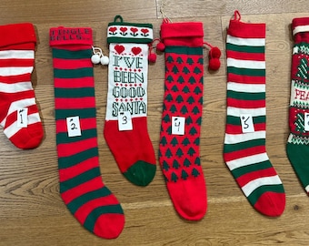 Vintage knit Christmas stockings  Six are available at this time. Numbered 1 ,2,3,4,5,and 6