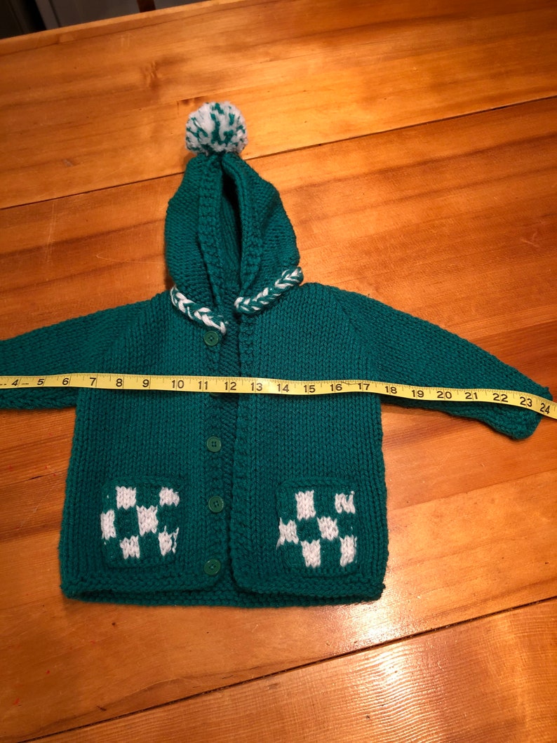 Childs handmade hooded green and white sweater
