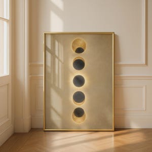 May include: A vertical framed wall art print featuring five circular phases of a solar eclipse arranged in a column. Each circle displays a dark sphere surrounded by a glowing golden halo against a textured, muted beige background.