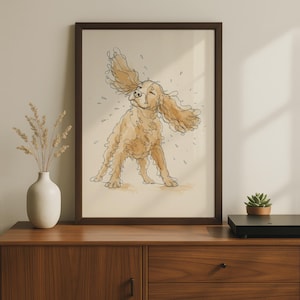 May include: A framed wall art print featuring a continuous line drawing of a golden-coloured spaniel dog shaking its body, with watercolour-style splashes of tan and brown paint surrounding the dog on a light beige background.