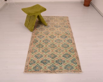 Alfombra vintage de lana turca • Diseño geométrico azteca (90 x 180 cm)