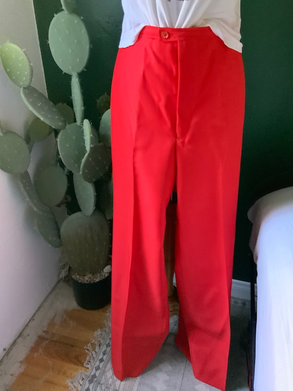 Red vintage high waist pants with a wide leg