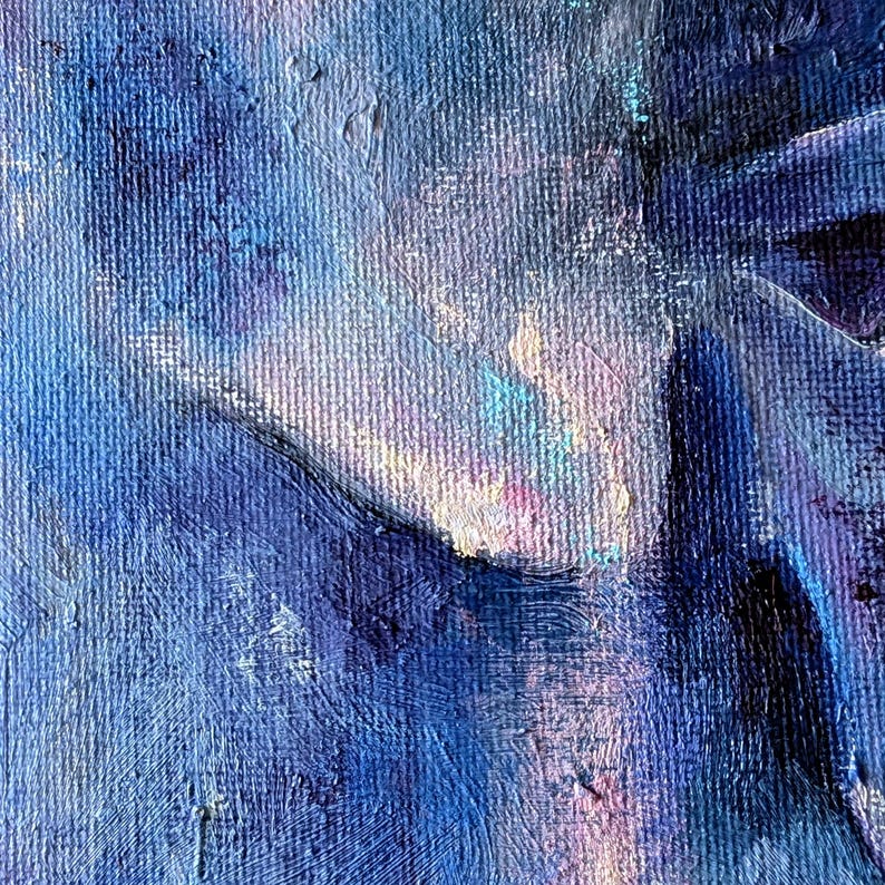 May include: Close-up of an abstract oil painting with a textured canvas. The artwork features a blend of blues, purples, and hints of pink and white, creating a soft, ethereal effect. The brushstrokes are visible, adding depth and dimension to the piece.