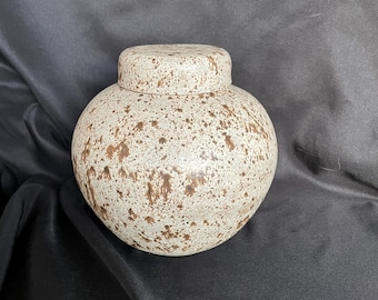 Handmade ceramic container with lid. For functional use in the kitchen or home decoration and decor.