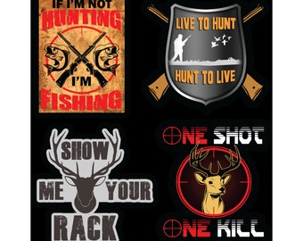 May include: Four hunting-themed stickers with different designs. The first sticker is a vintage-style poster with the text "If I'm not hunting I'm fishing". The second sticker features a shield with the text "Live to hunt, hunt to live". The third sticker shows a deer head with the text "Show me your rack". The fourth sticker has a deer head in a target with the text "One shot, one kill".