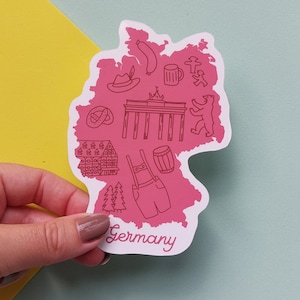 Germany Sticker Waterproof Germany map sticker country outline with icons from Germany including Lederhosen, Brandenburg Gate and more image 1