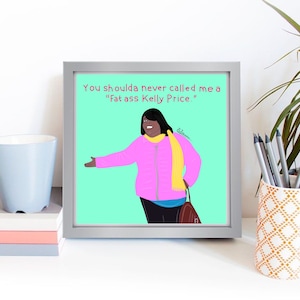 May include: Framed artwork with a cartoon illustration of a woman in a pink jacket and yellow scarf. The artwork includes the text: "You shoulda never called me a 'Fat ass Kelly Price.'" The artwork is displayed on a white surface.