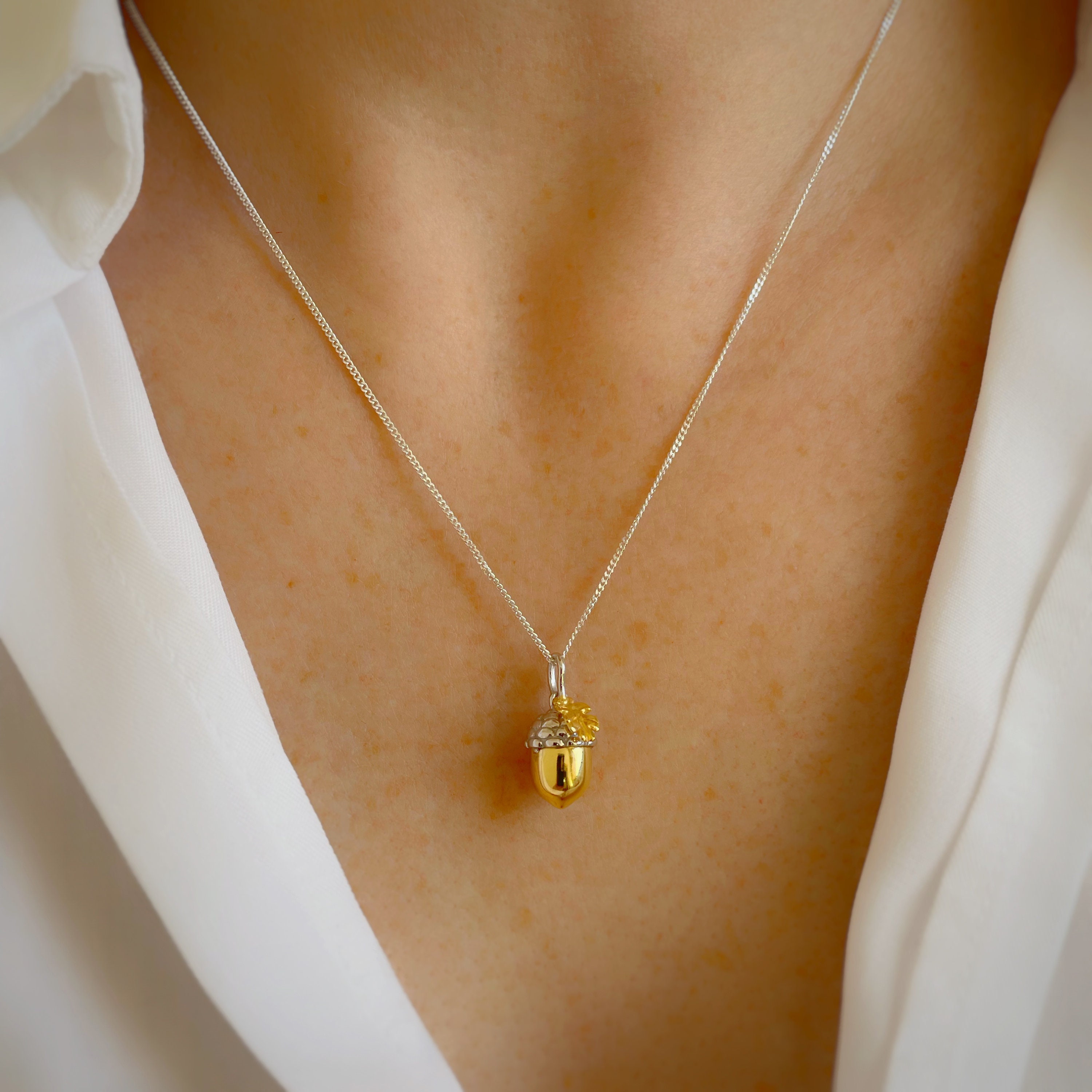 Gold acorn best sale pendant