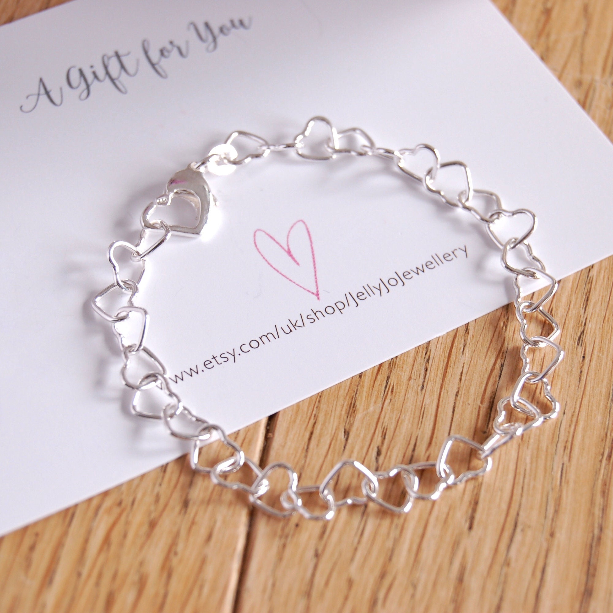Silver heart link bracelet online