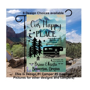 May include: A watercolor-style garden flag with a camper, mountains, trees, and a crescent moon. The text reads "Our Happy Place" and "Brian & Krista Beaverton, Oregon".