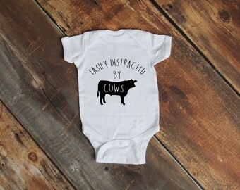 Easily Distracted by Cows Baby Bodysuit