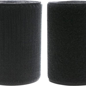 May include: Two rolls of black hook and loop fastener tape. The tape is rolled up and ready to be used for crafts, sewing, or other projects.