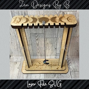 Pendulum Stand Laser SVG, It&#39;s Just a Phase, Pendulum Stand with Moon Phases. Slots are set for Sande Ply 0.20&quot;
