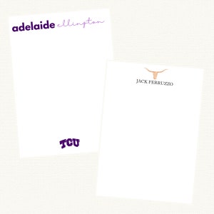 May include: Two white notecards with personalized text. The top card has the name "adelaide ellington" written in purple script. The bottom card has the text "TCU" in purple. The second card has a brown bull head with horns and the text "JACK FERRUZZO" underneath.