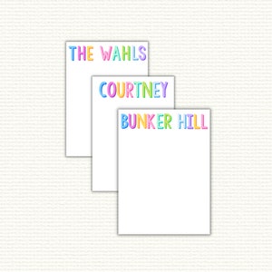 May include: Three white notepads with colorful text. The top notepad says "THE WAHLS", the middle notepad says "COURTNEY", and the bottom notepad says "BUNKER HILL".