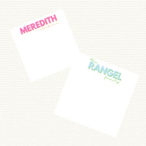May include: Two white notepads with colorful text. The top notepad has the text "MEREDITH claireborne" in pink with a yellow outline. The bottom notepad has the text "the RANGEL family" in light blue with a green outline.