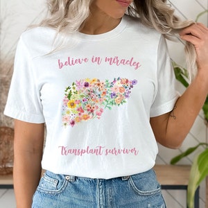 Camiseta de regalo para supervivientes de trasplante de hígado, camiseta de concienciación sobre la donación de órganos, regalo para cirugía de trasplante de hígado, cree en milagros