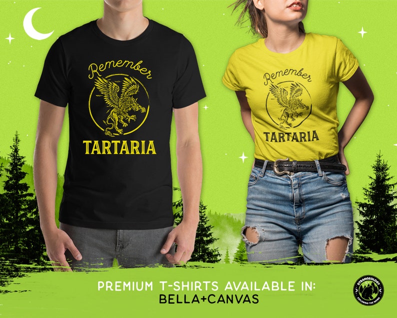 Peut inclure: Deux t-shirts avec un motif noir et jaune repr&eacute;sentant une cr&eacute;ature mythique et le texte "Remember Tartaria".