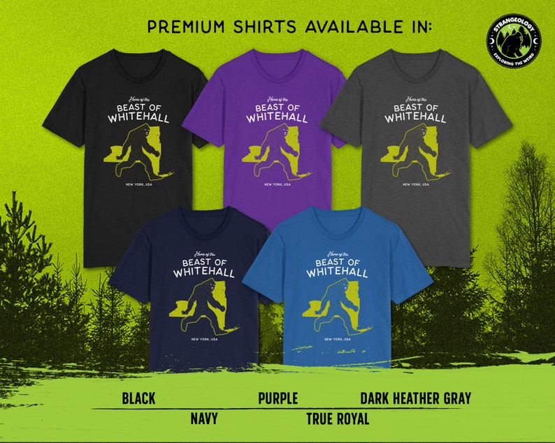 May include: Premium t-shirts featuring a yellow graphic of the Beast of Whitehall, a mythical creature, running across a map of New York State. The shirts are available in black, purple, navy, and dark heather gray.