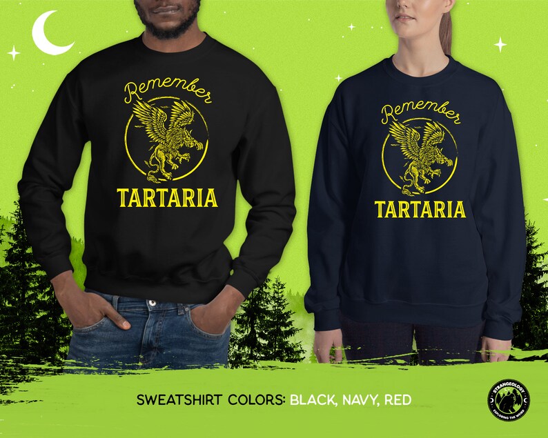 Peut inclure: Sweat-shirts noirs et bleu marine avec un motif jaune d'un griffon avec le texte "Remember Tartaria".