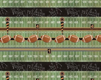 May include: A repeating fabric pattern featuring a green American football field with white yard lines and numbers, alternating with black horizontal bands displaying white chalk-style play diagrams, brown footballs, and orange yard markers.
