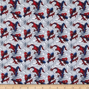 May include: A white fabric with a repeating pattern of red and blue Spiderman characters swinging on a web. The background is a light gray with a web pattern.