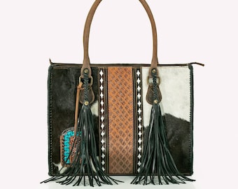 Bolso de mano Boho Cowhide con estampado con herramientas manuales y detalles de borlas / Elegancia occidental