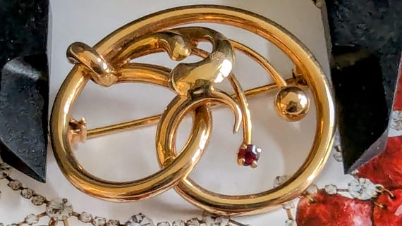 18K Gold And Ruby Brooch - image 1