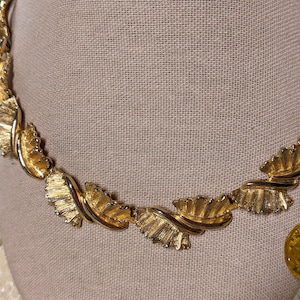 Monet Oscar Swoop Bow Gold Tone Necklace