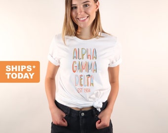 bid day basket alpha gam tshirt alpha gam tee Bella+Canvas Short Sleeve Tee big little reveal agd custom Alpha Gamma Delta