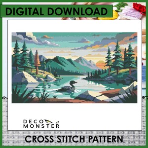 May include: Digital download cross stitch pattern featuring a scenic landscape with a lake, mountains, and trees. The image includes a loon in the water and the text "DIGITAL DOWNLOAD" and "CROSS STITCH PATTERN". The Deco Monster logo is also visible.