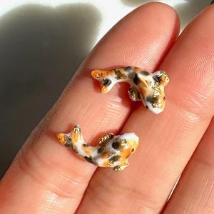 Koi fish stud earrings - orange/black and gold flecked- polymer clay earrings