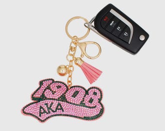 Llavero de la hermandad Alpha Kappa Alpha 1908