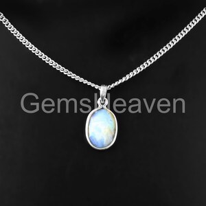 Sterling Silver Opal Pendant: Faceted Oval, White Gemstone