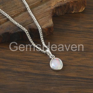 Ethiopian Opal Pendant: Oval White Opal, Sterling Silver Jewelry