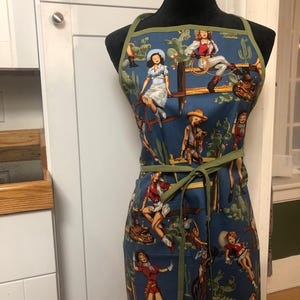 Howdy Cowgirl Alexander Henry Pin Up Apron with Spicy Pocket Detail