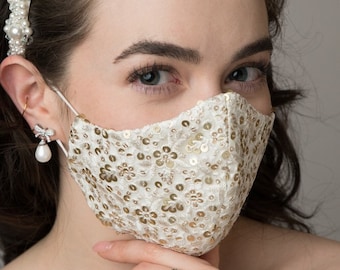 Stunning off white and gold floral sequinned lace mask, with nose wire and adjustable elastic Straps