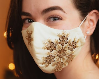 Creme  three layered Face mask with Sequin adorable, gold Snowflakes,comfortable cotton base, nose shaping wire and adjustable straps
