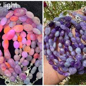 May include: Two images of gemstone necklaces. The left shows a necklace under UV light, with pink, orange, and purple stones. The right shows a necklace with purple and blue stones. Both necklaces have silver clasps.